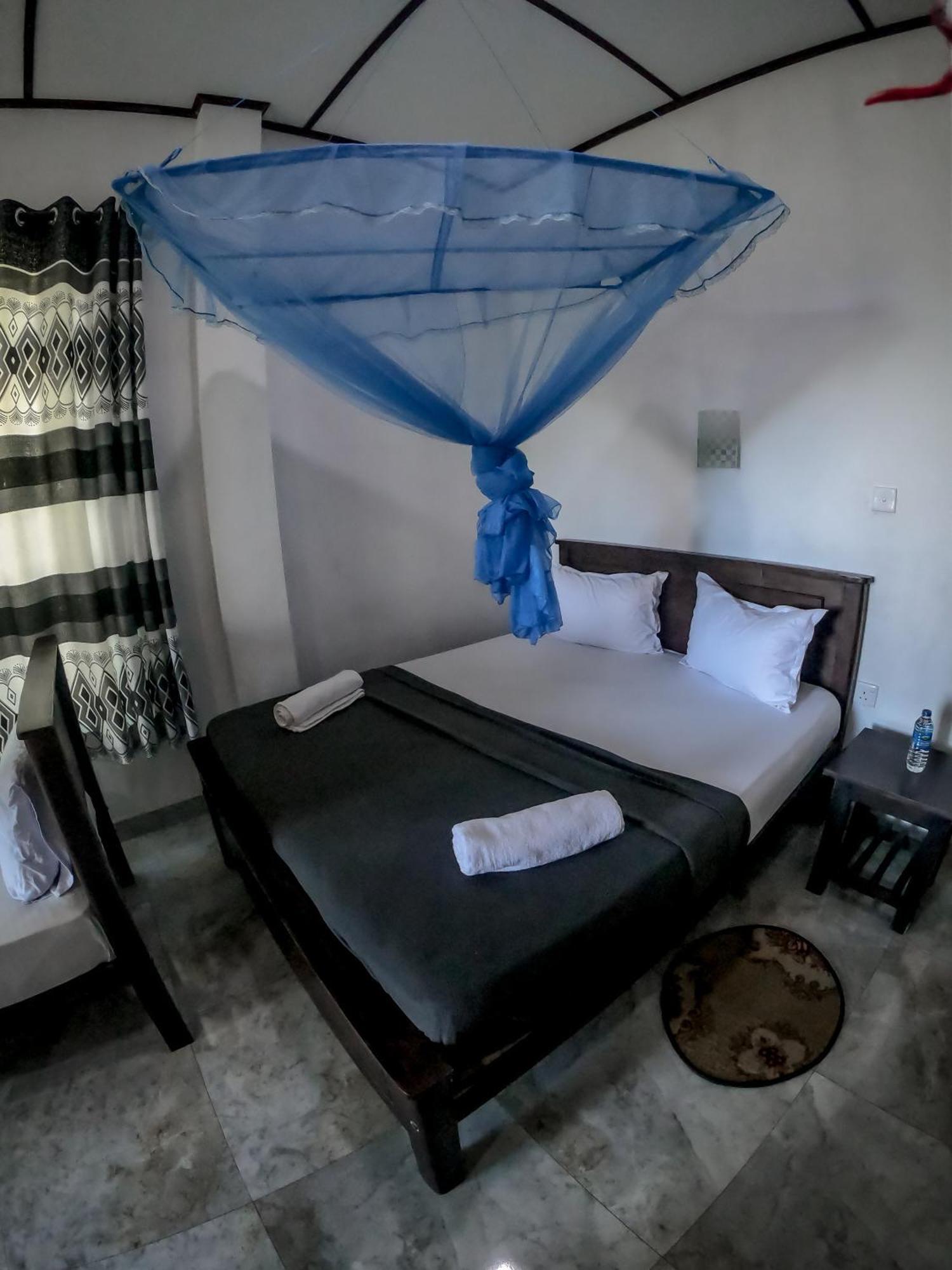 9 Arch View Rest Inn เอลลา ภายนอก รูปภาพ